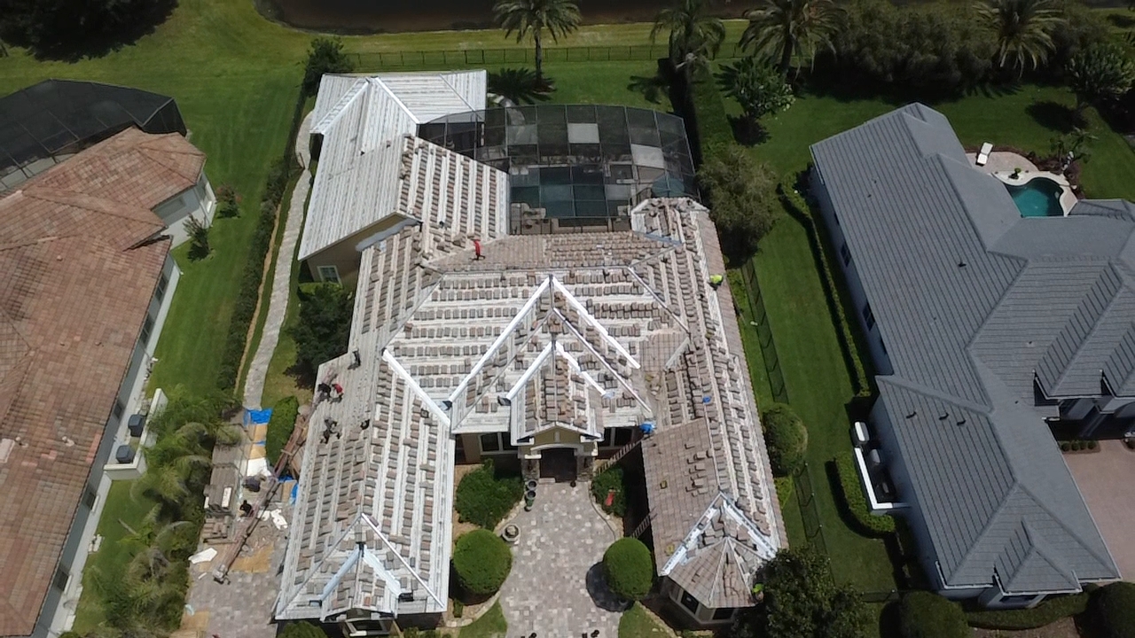 Tile roof replacement in progress with new underlayment installed